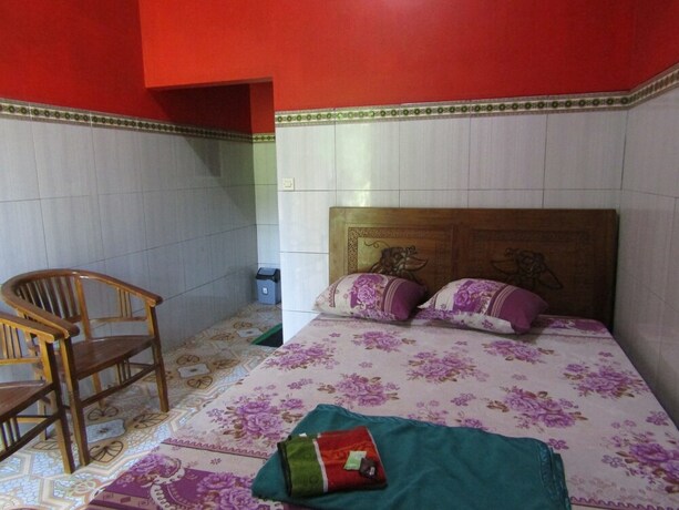 Imagen de la habitación del Hotel Penginapan Vionna. Foto 14