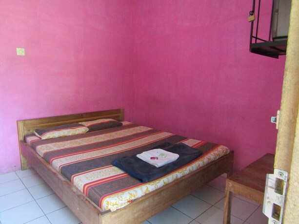 Imagen de la habitación del Hotel Penginapan Vionna. Foto 17