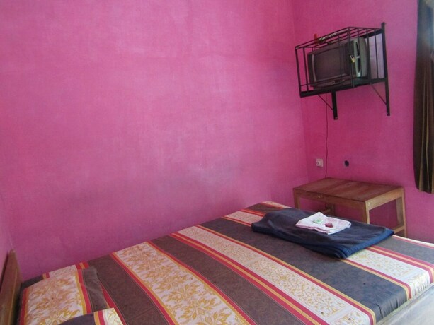 Imagen de la habitación del Hotel Penginapan Vionna. Foto 19