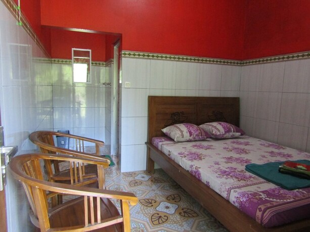 Imagen de la habitación del Hotel Penginapan Vionna. Foto 20