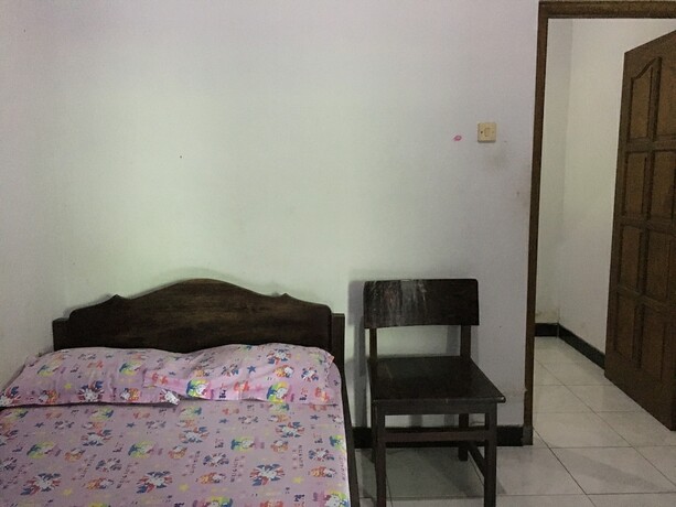 Imagen de la habitación del Hotel Penginapan Vionna. Foto 22