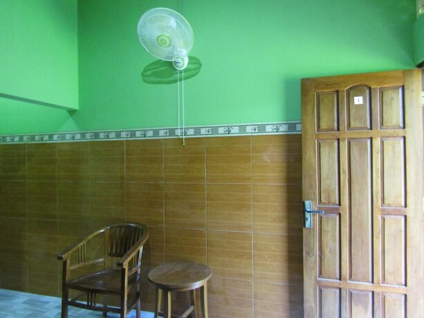 Imagen de la habitación del Hotel Penginapan Vionna. Foto 23