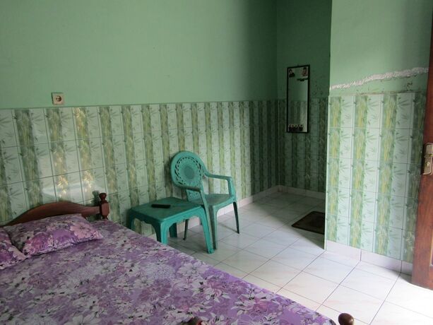 Imagen de la habitación del Hotel Penginapan Vionna. Foto 25