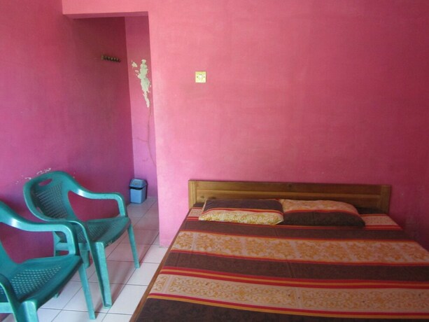 Imagen de la habitación del Hotel Penginapan Vionna. Foto 26