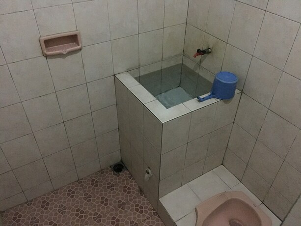 Imagen de la habitación del Hotel Penginapan Vionna. Foto 27