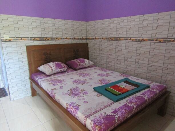 Imagen de la habitación del Hotel Penginapan Vionna. Foto 32