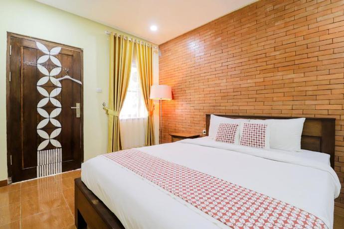 Imagen de la habitación del Hotel Penginapan Widodo Syariah Borobudur by Zuzu. Foto 3