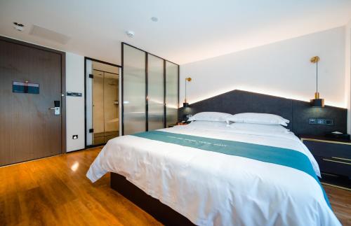 Imagen de la habitación del Hotel Pengke Boutique - Sungang Sunway Station. Foto 17