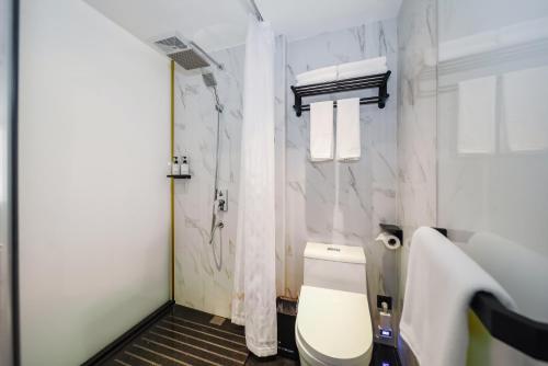 Imagen de la habitación del Hotel Pengke Boutique - Sungang Sunway Station. Foto 19