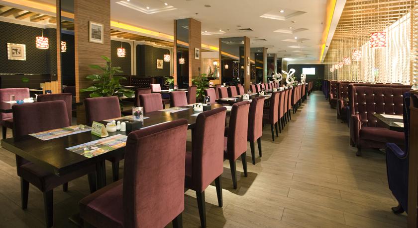 Imagen del bar/restaurante del Hotel Pengke Deluxe Collection Hotel. Foto 4