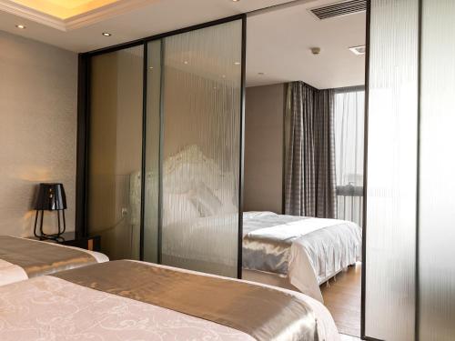 Imagen general del Hotel Pengman Beijing Rd. A-mall Apartment. Foto 3