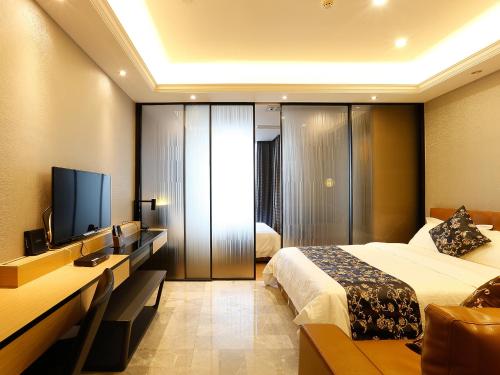 Imagen general del Hotel Pengman Beijing Rd. A-mall Apartment. Foto 5