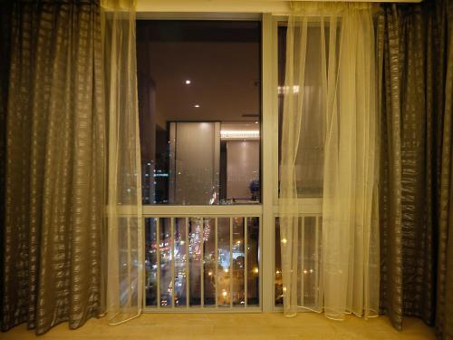 Imagen de la habitación del Hotel Pengman Beijing Rd. A-mall Apartment. Foto 6