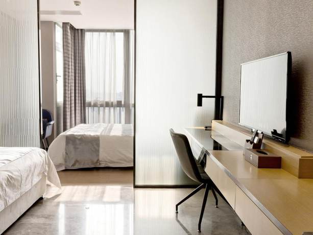 Imagen de la habitación del Hotel Pengman International Apartment. Foto 9