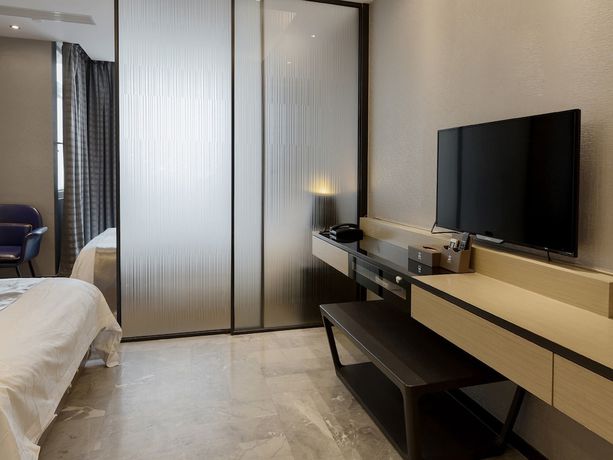 Imagen de la habitación del Hotel Pengman International Apartment. Foto 10