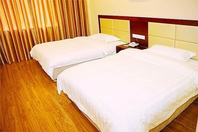 Imagen de la habitación del Hotel Pengyuan. Foto 4