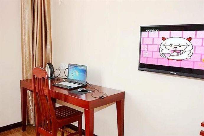 Imagen de la habitación del Hotel Pengyuan. Foto 5