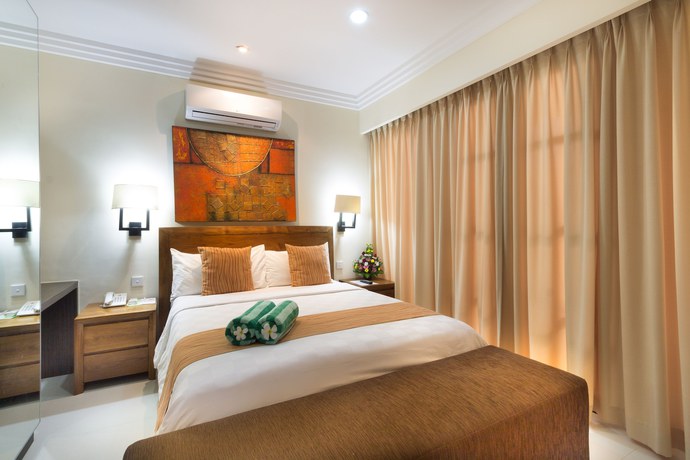 Imagen de la habitación del Hotel Peninsula Bay Resort. Foto 2