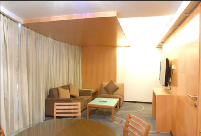 Imagen de la habitación del Hotel Peninsula Grand. Foto 2