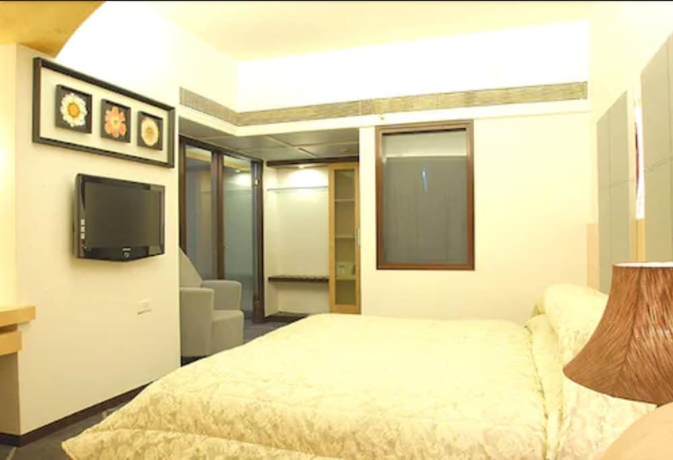 Imagen de la habitación del Hotel Peninsula Grand. Foto 3
