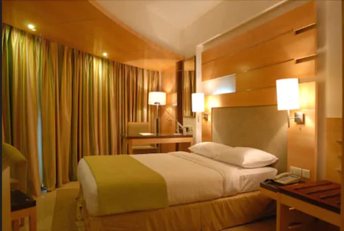 Imagen de la habitación del Hotel Peninsula Grand. Foto 4