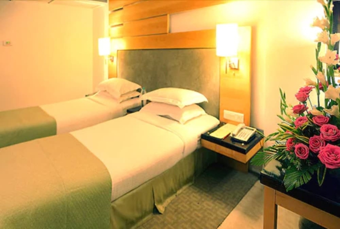 Imagen de la habitación del Hotel Peninsula Grand. Foto 5