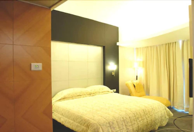 Imagen de la habitación del Hotel Peninsula Grand. Foto 9