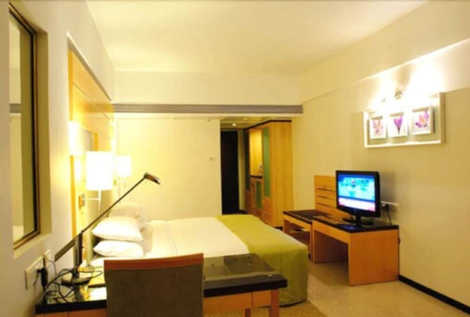 Imagen de la habitación del Hotel Peninsula Grand. Foto 10