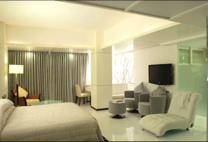 Imagen de la habitación del Hotel Peninsula Grand. Foto 11