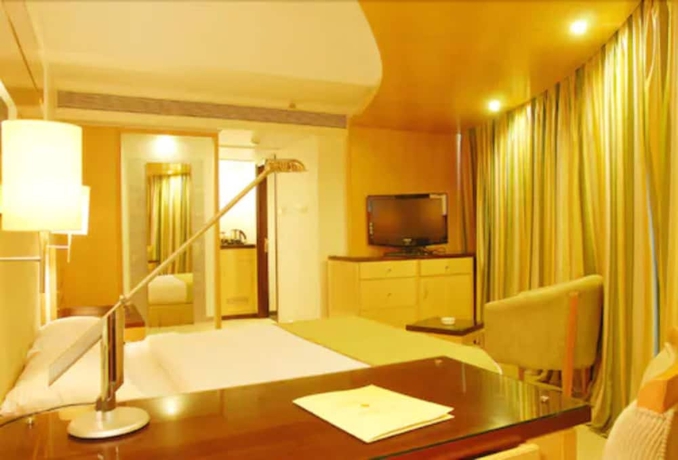 Imagen de la habitación del Hotel Peninsula Grand. Foto 14