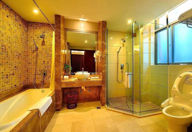 Imagen de la habitación del Hotel Peninsula Hotel - Zhaoqing. Foto 2