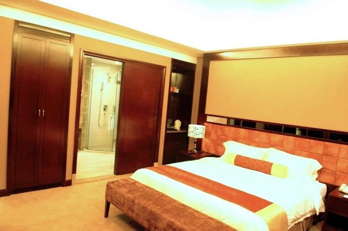 Imagen de la habitación del Hotel Peninsula Hotel - Zhaoqing. Foto 4