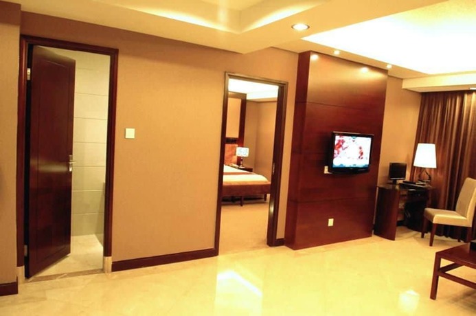 Imagen de la habitación del Hotel Peninsula Hotel - Zhaoqing. Foto 5