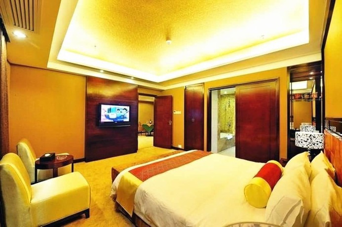 Imagen de la habitación del Hotel Peninsula Hotel - Zhaoqing. Foto 6