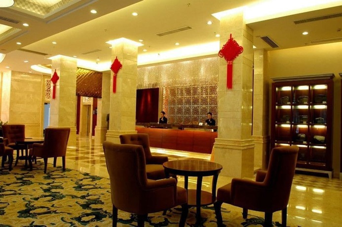 Imagen de la habitación del Hotel Peninsula Hotel - Zhaoqing. Foto 9