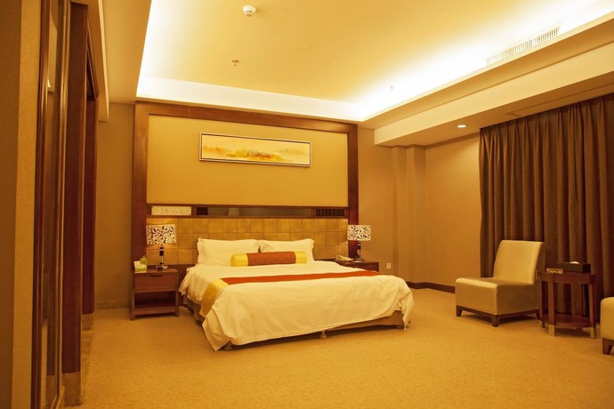 Imagen de la habitación del Hotel Peninsula Hotel - Zhaoqing. Foto 13