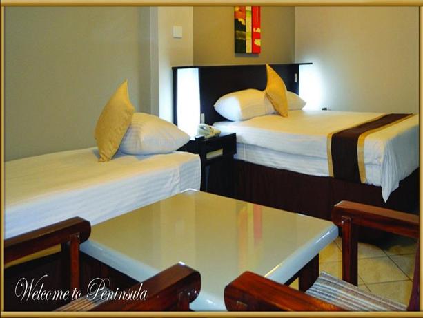 Imagen de la habitación del Hotel Peninsula International. Foto 7