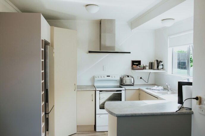 Imagen de la habitación del Hotel Peninsula Motel, Cooks Beach. Foto 11
