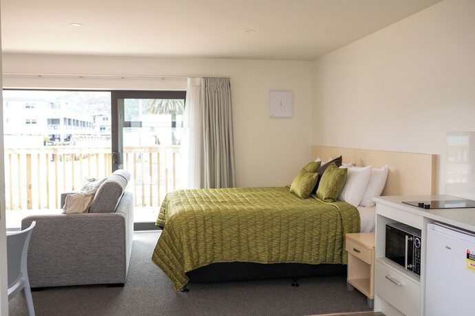 Imagen de la habitación del Hotel Peninsula Motel, Cooks Beach. Foto 15