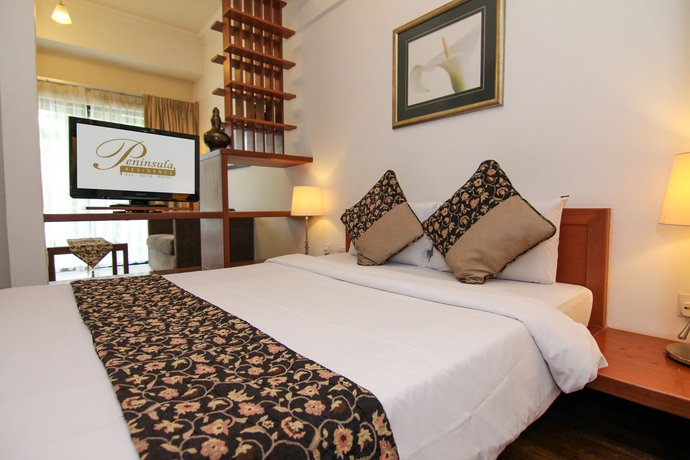 Imagen de la habitación del Hotel Peninsula Residence All Suite Hotel. Foto 5