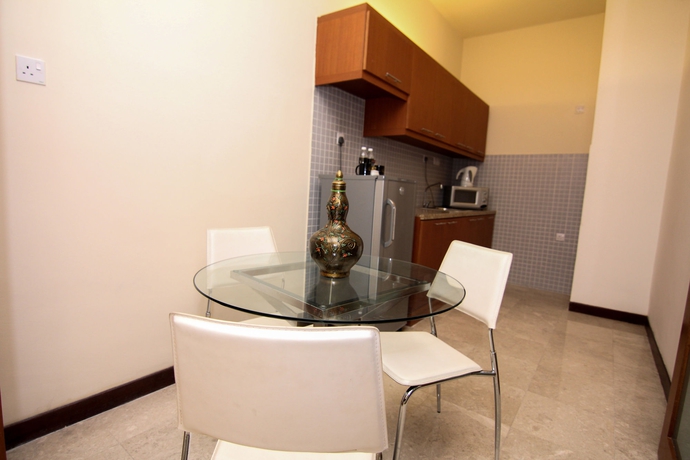 Imagen de la habitación del Hotel Peninsula Residence All Suite Hotel. Foto 8