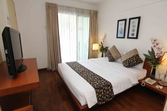 Imagen de la habitación del Hotel Peninsula Residence All Suite Hotel. Foto 10
