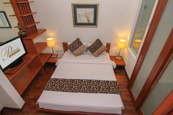 Imagen de la habitación del Hotel Peninsula Residence All Suite Hotel. Foto 11