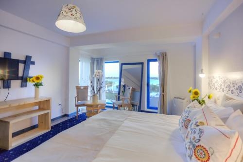Imagen de la habitación del Hotel Peninsula Resort. Foto 7