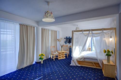 Imagen de la habitación del Hotel Peninsula Resort. Foto 8