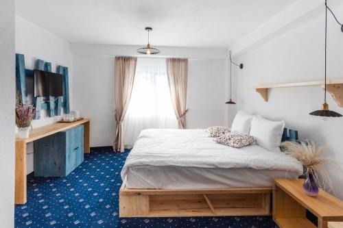 Imagen de la habitación del Hotel Peninsula Resort. Foto 9