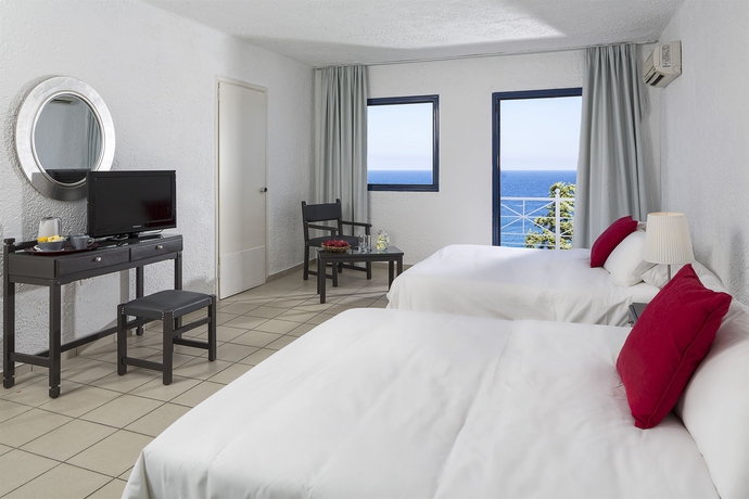 Imagen de la habitación del Hotel Peninsula Resort and Spa. Foto 8