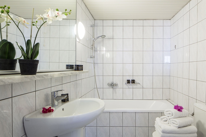 Imagen de la habitación del Hotel Peninsula Resort and Spa. Foto 12