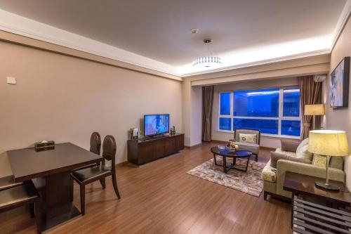 Imagen de la habitación del Hotel Peninsula Season Apartment. Foto 10