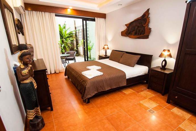 Imagen de la habitación del Hotel Penn Sunset Villa 4. Foto 1